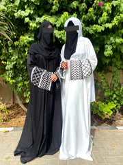 "Zaytun-Riwaaya" Classic Contrast Abaya | Black & White Palestinian Embroidery | Soft Flowing Fabric Abaya